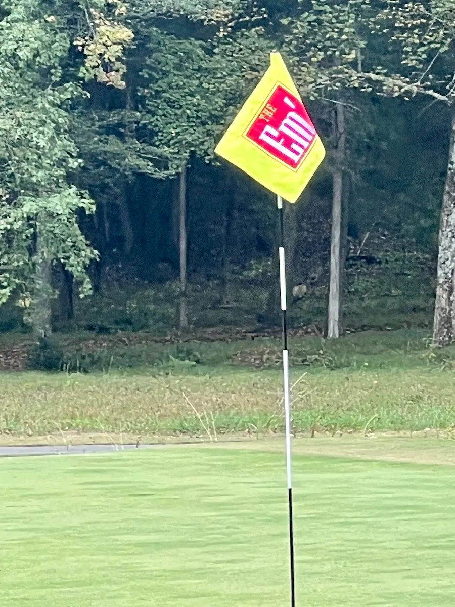 The Em’ flag on the green